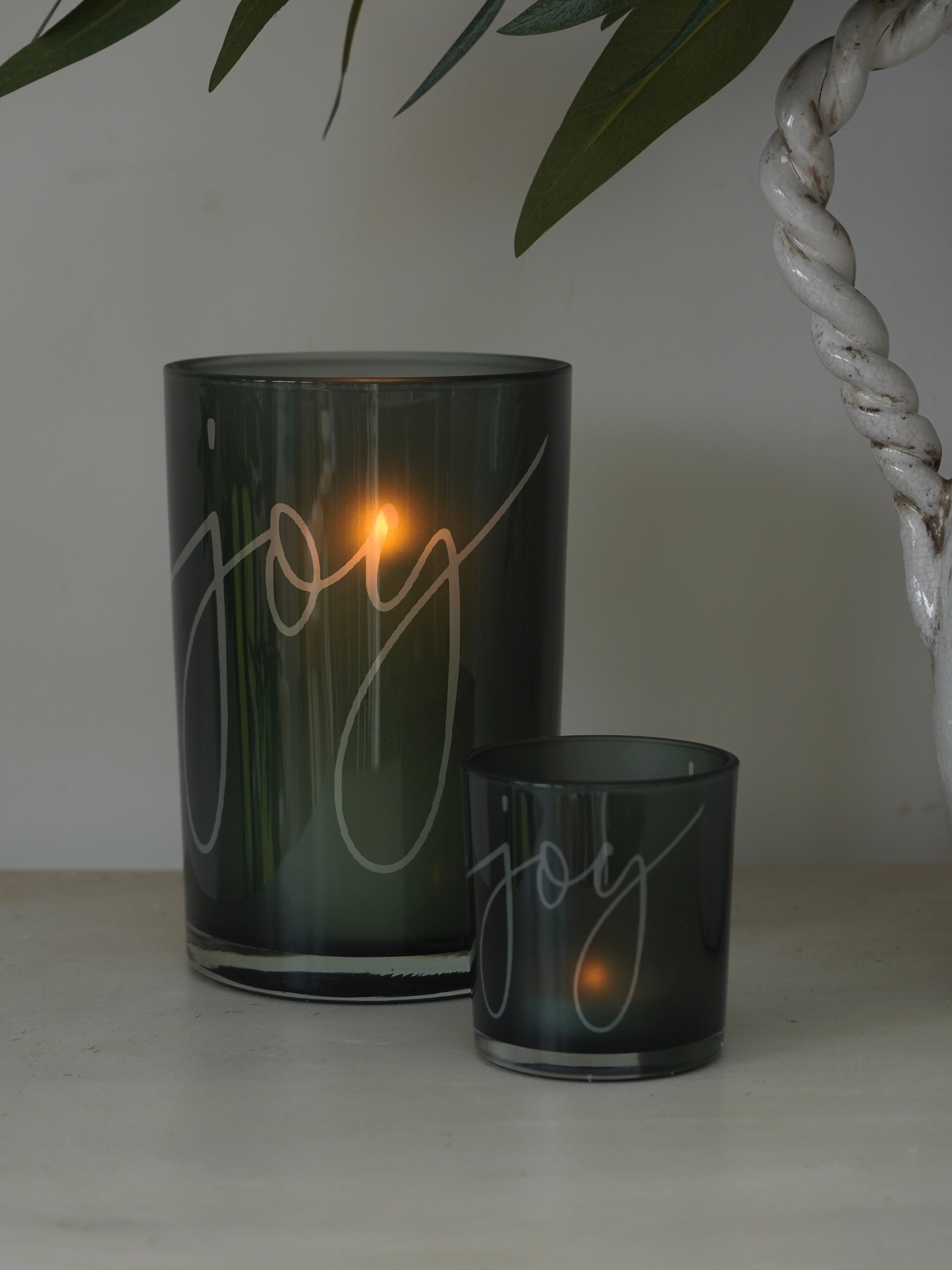 Two dark glass containers with &