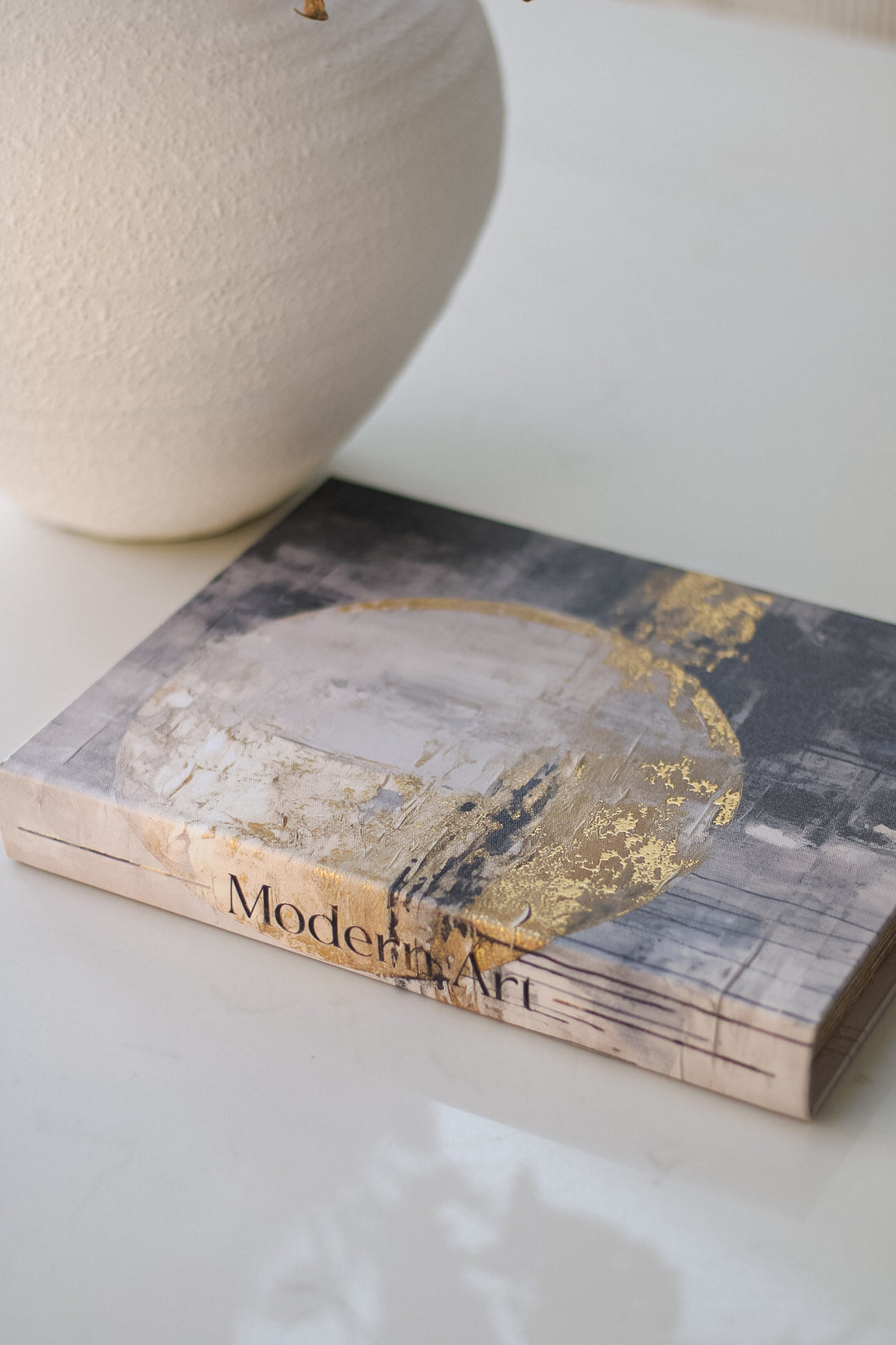 up close of moonlight modern art storage book box ornament