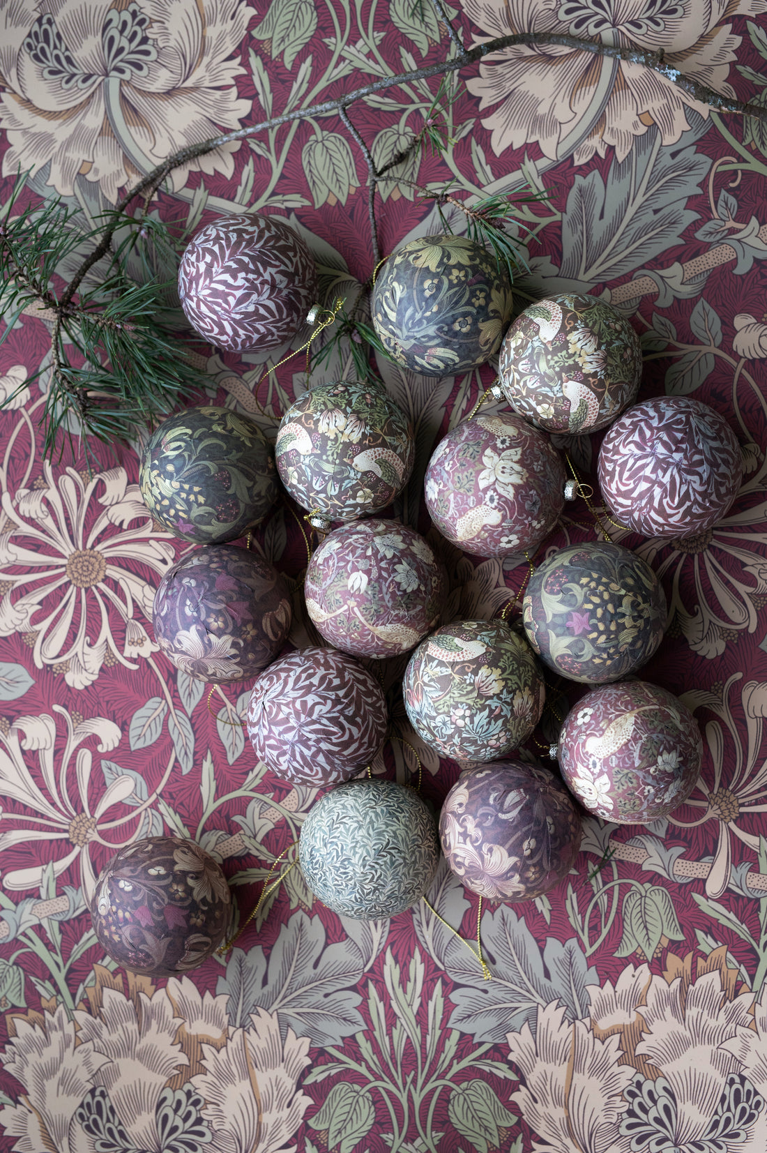 Decorative ornaments with floral patterns on a patterned fabric background