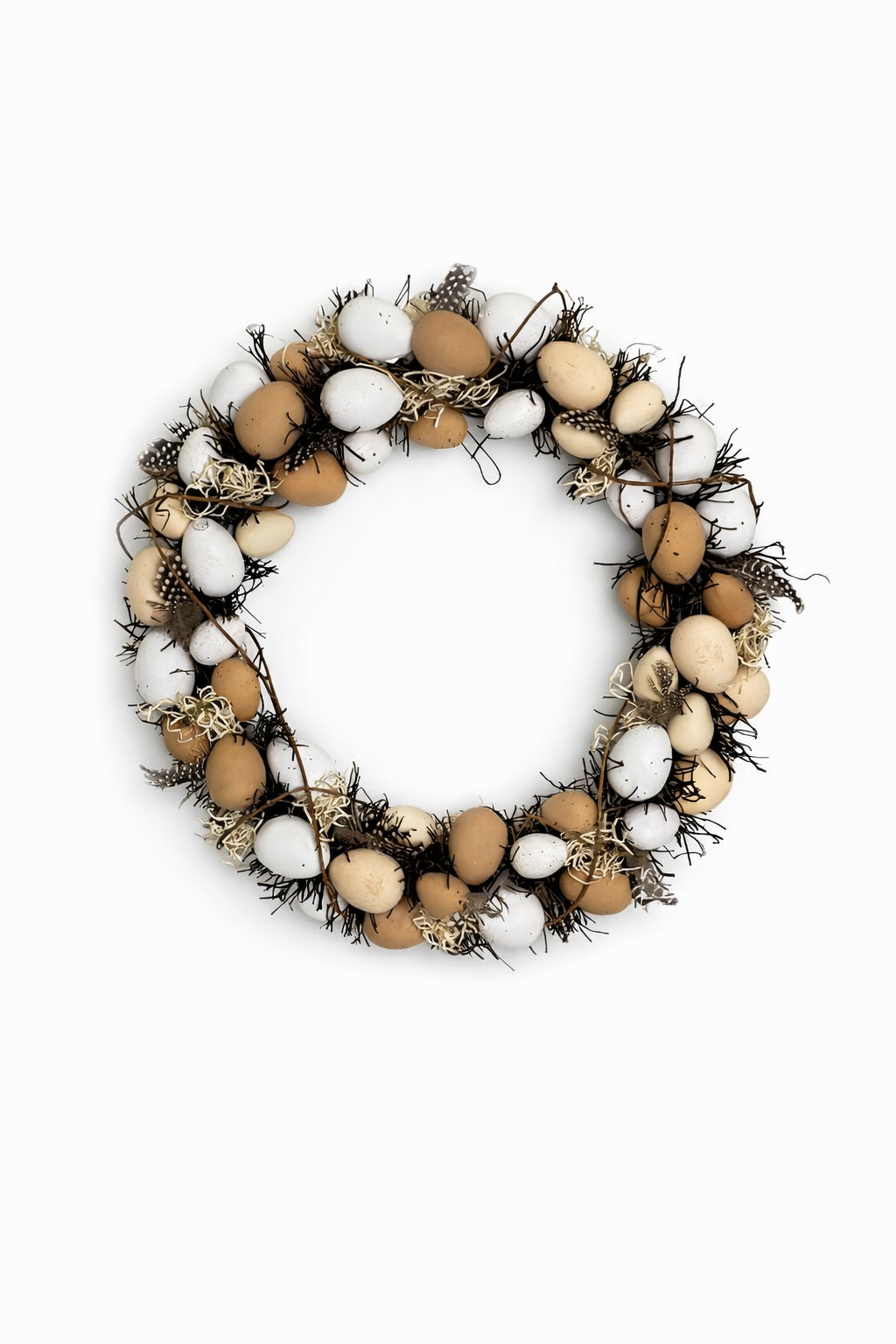 Decorative wreath made of eggs and feathers on a white background