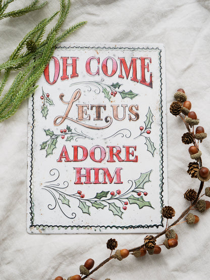 Decorative sign with Christmas text and decorations on a white background