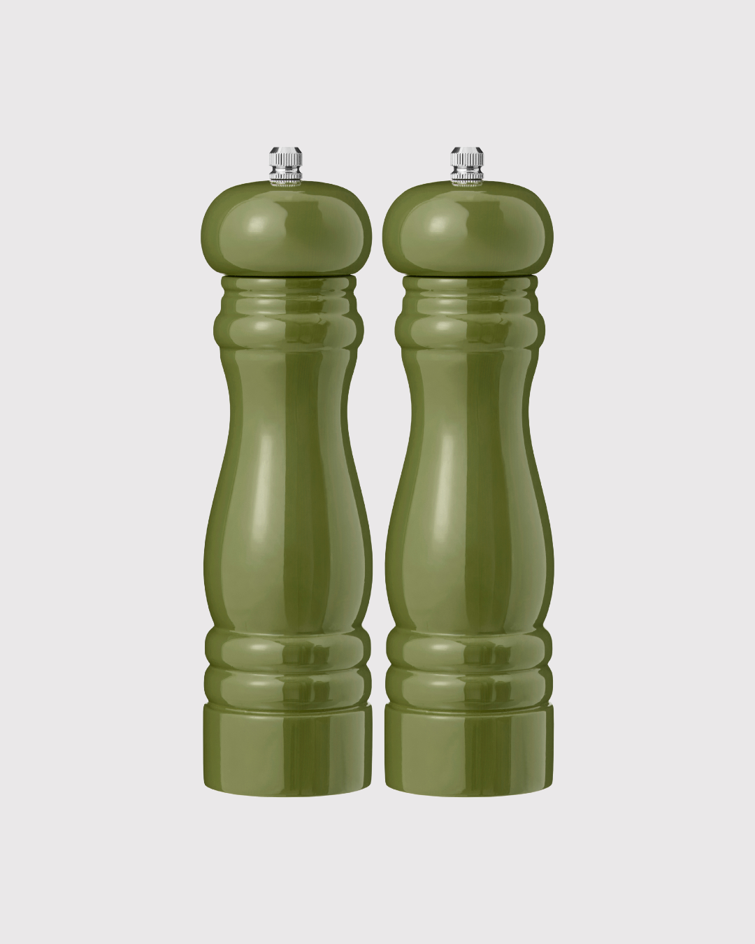 Two green salt and pepper mills on a white background