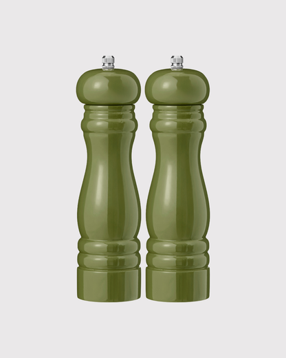 Two green salt and pepper mills on a white background