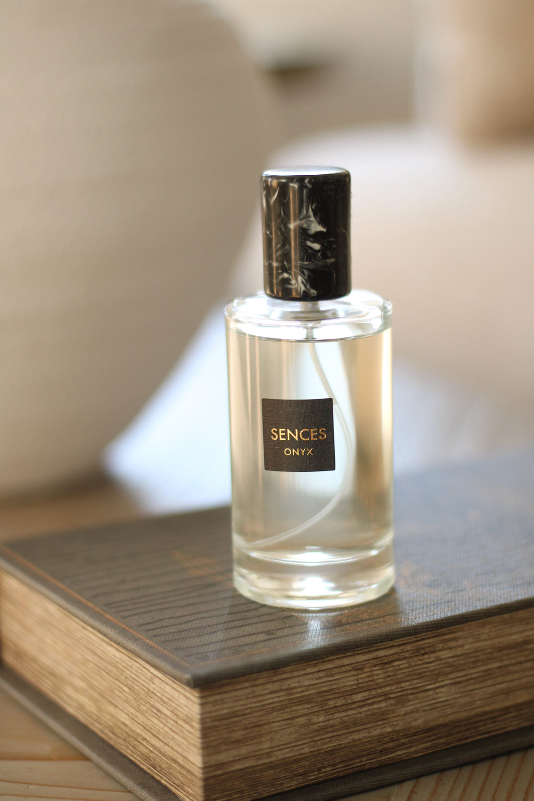 Room spray bottle labeled &