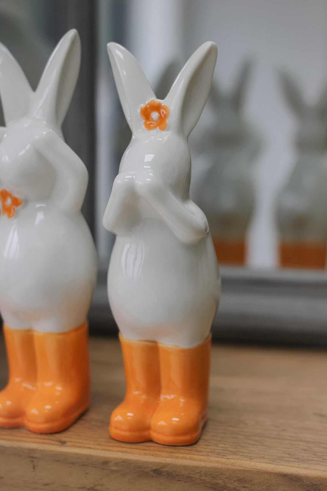 close up of porcelain bunny with orange boots
