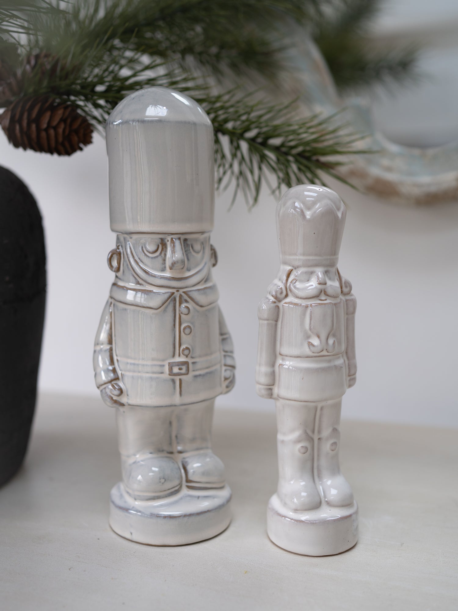 set of white stoneware nutcrackers, vintage inspired christmas decorations