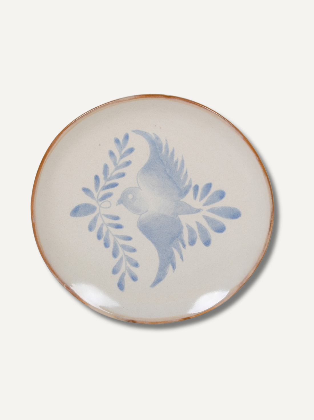 Ceramic plate with blue bird design on a white background