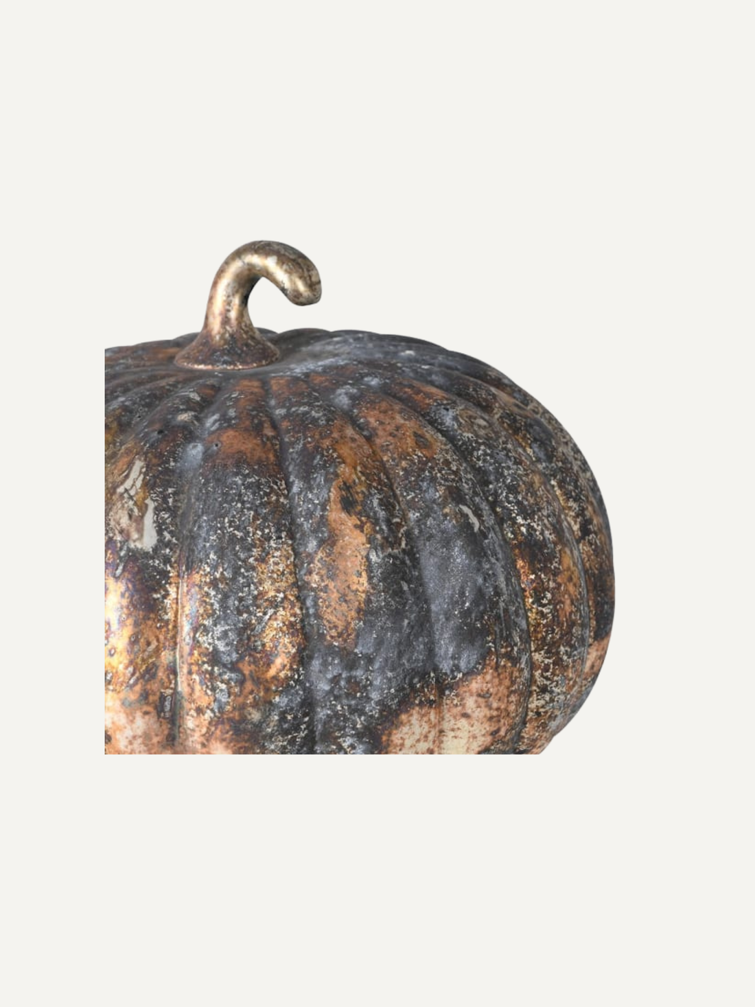 Up close of vintage style patina glass pumpkin