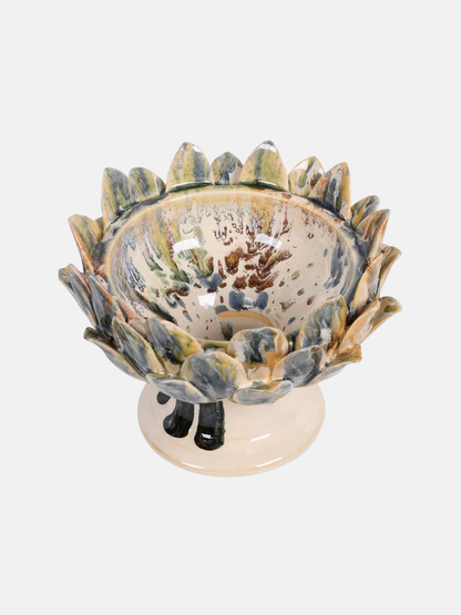 Ceramic bowl with decorative edge on a white background