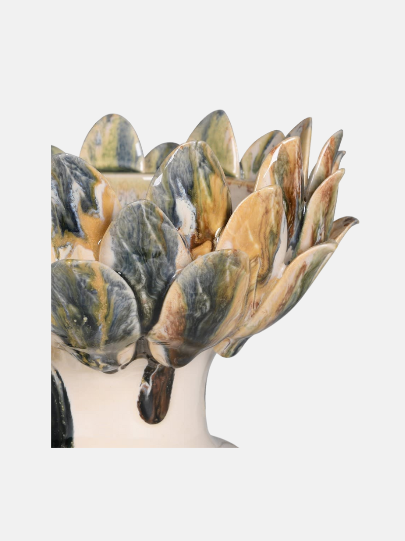 Decorative vase with a unique design on a white background