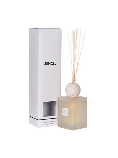 Sences diffuser with packaging on a white background