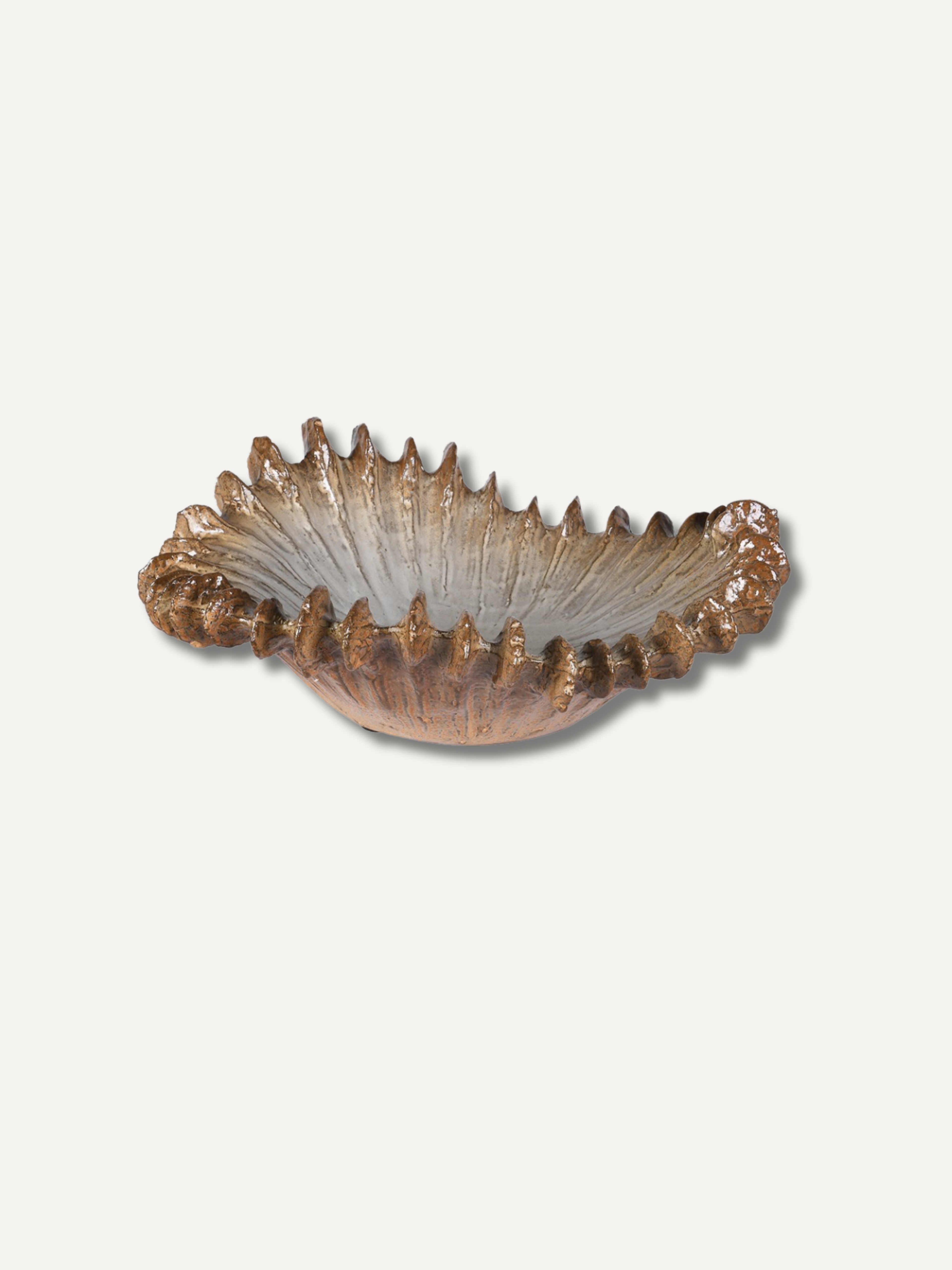 A sculptural, shell-like bowl with a textured, ribbed exterior in earthy brown and bronze tones, and a smooth, frosted interior, shown on a plain off-white background.