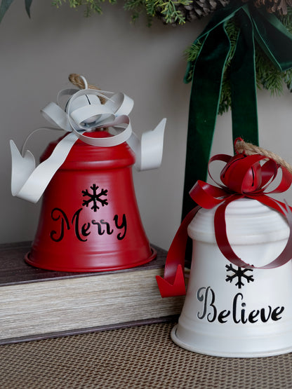 Two decorative ceramic bells with &