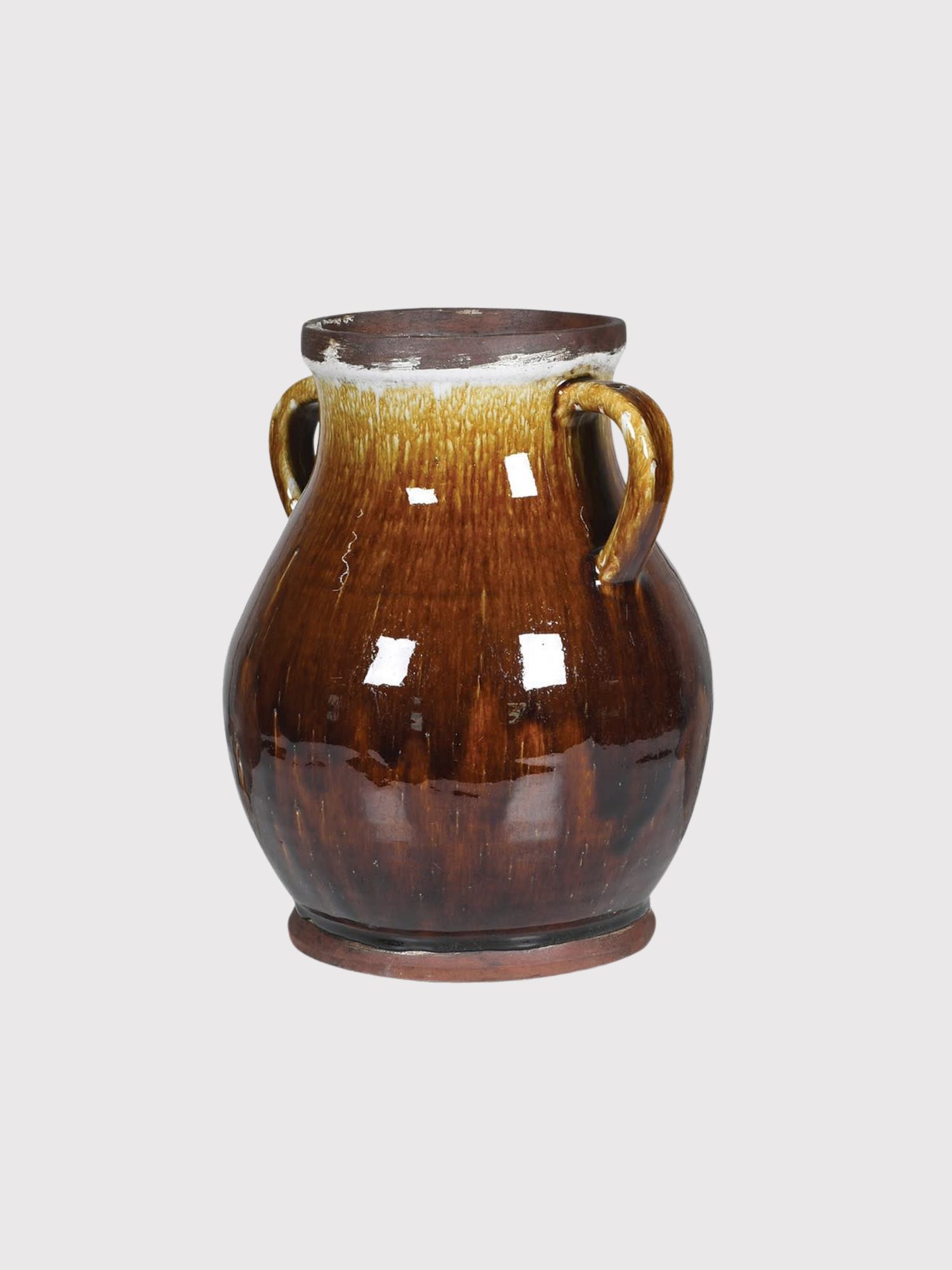 Brown ceramic amphora vase with two handles on a light gray background