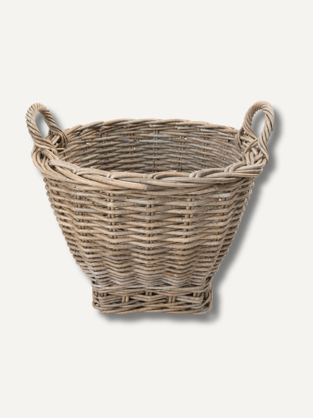 Woven basket with handles on a white background