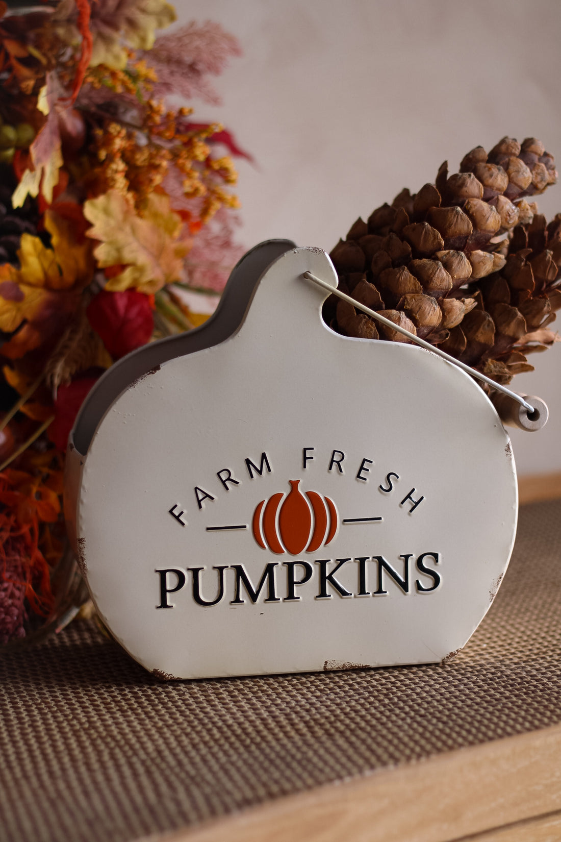 Decorative trug shaped like a pumpkin with &