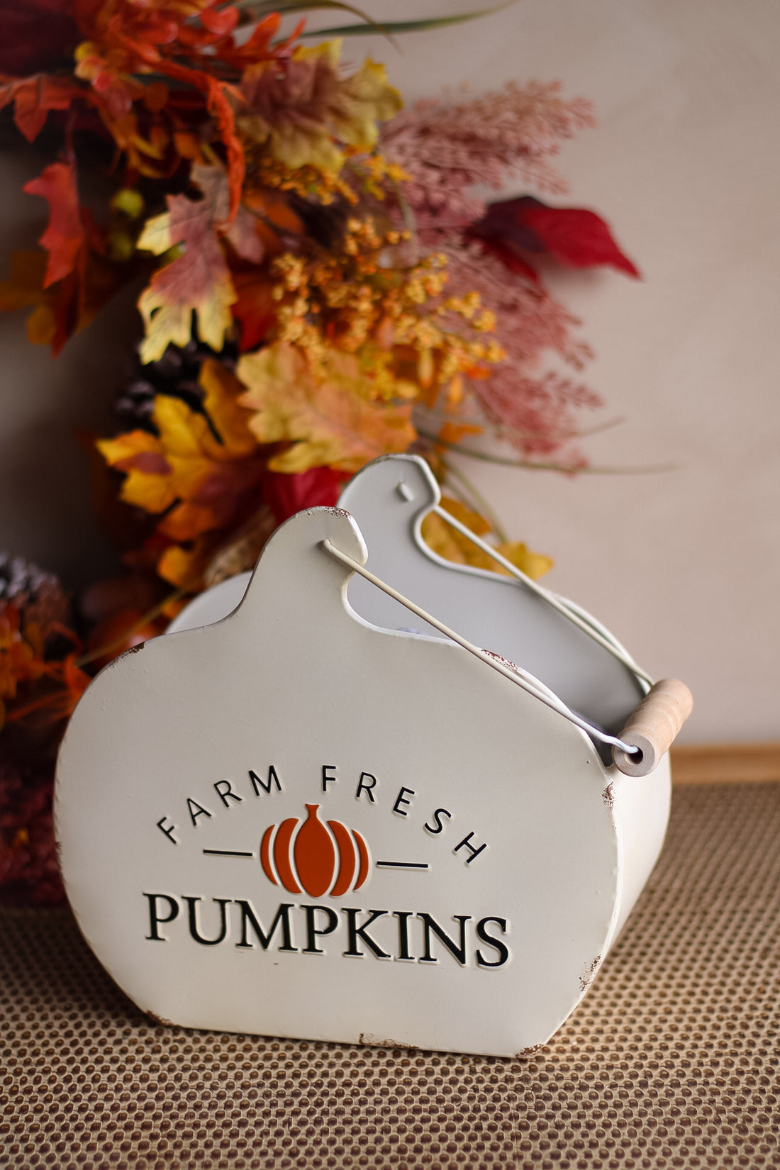 Decorative trug shaped like a pumpkin with &