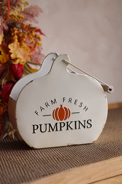 Decorative trug shaped like a pumpkin with &