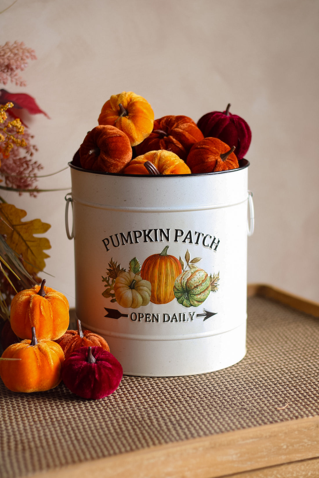 White bucket labeled &