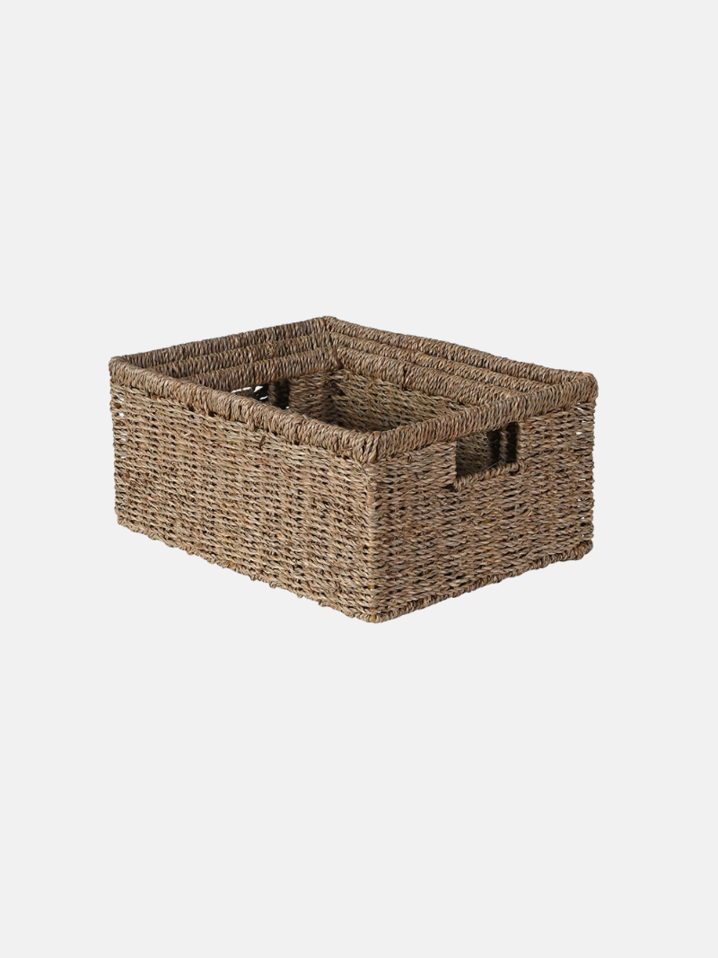 Woven storage basket on a white background