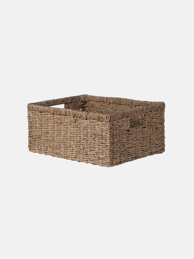 Woven storage basket on a white background