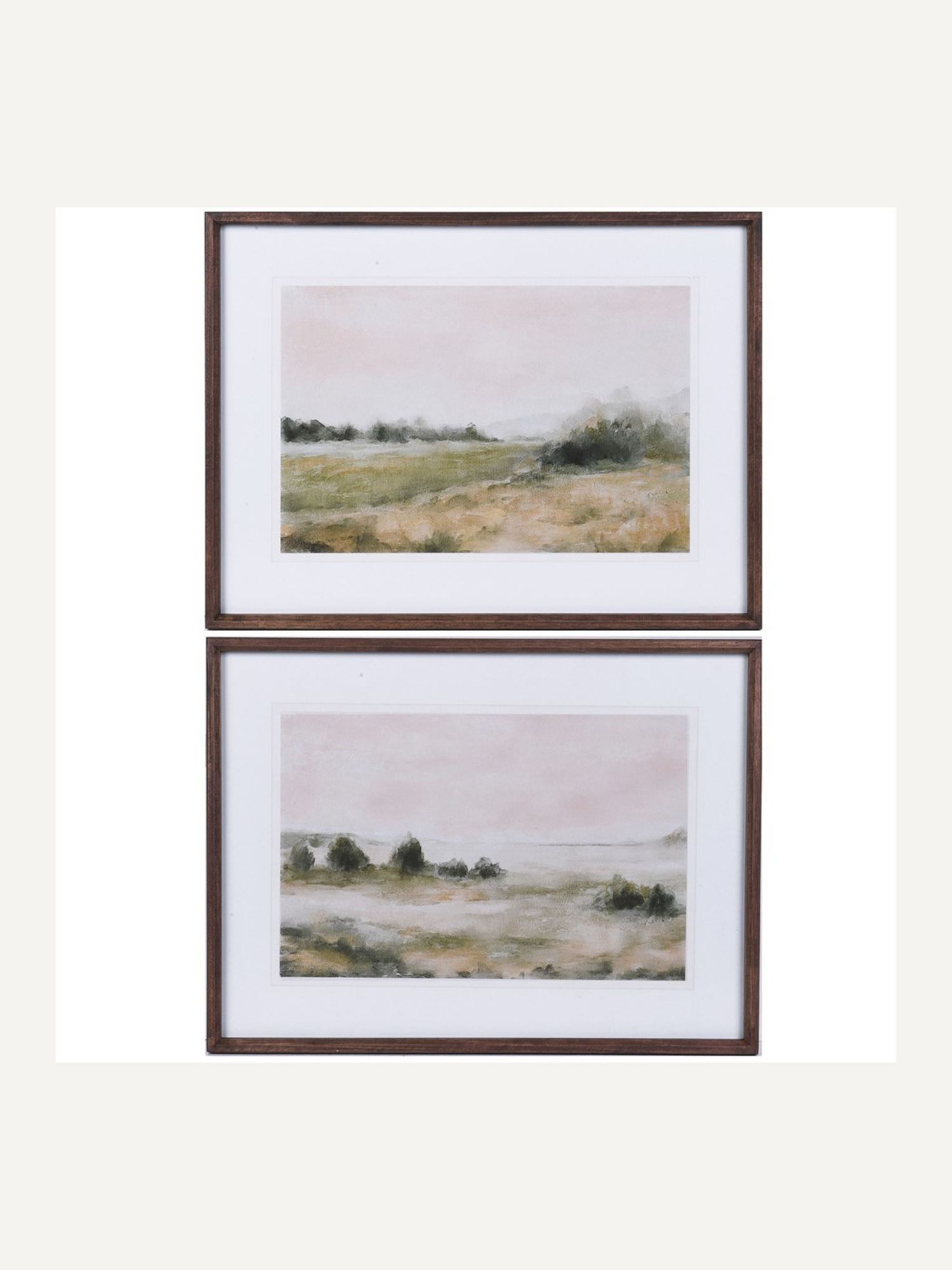 Two framed landscape prints of a shore line on a white background
