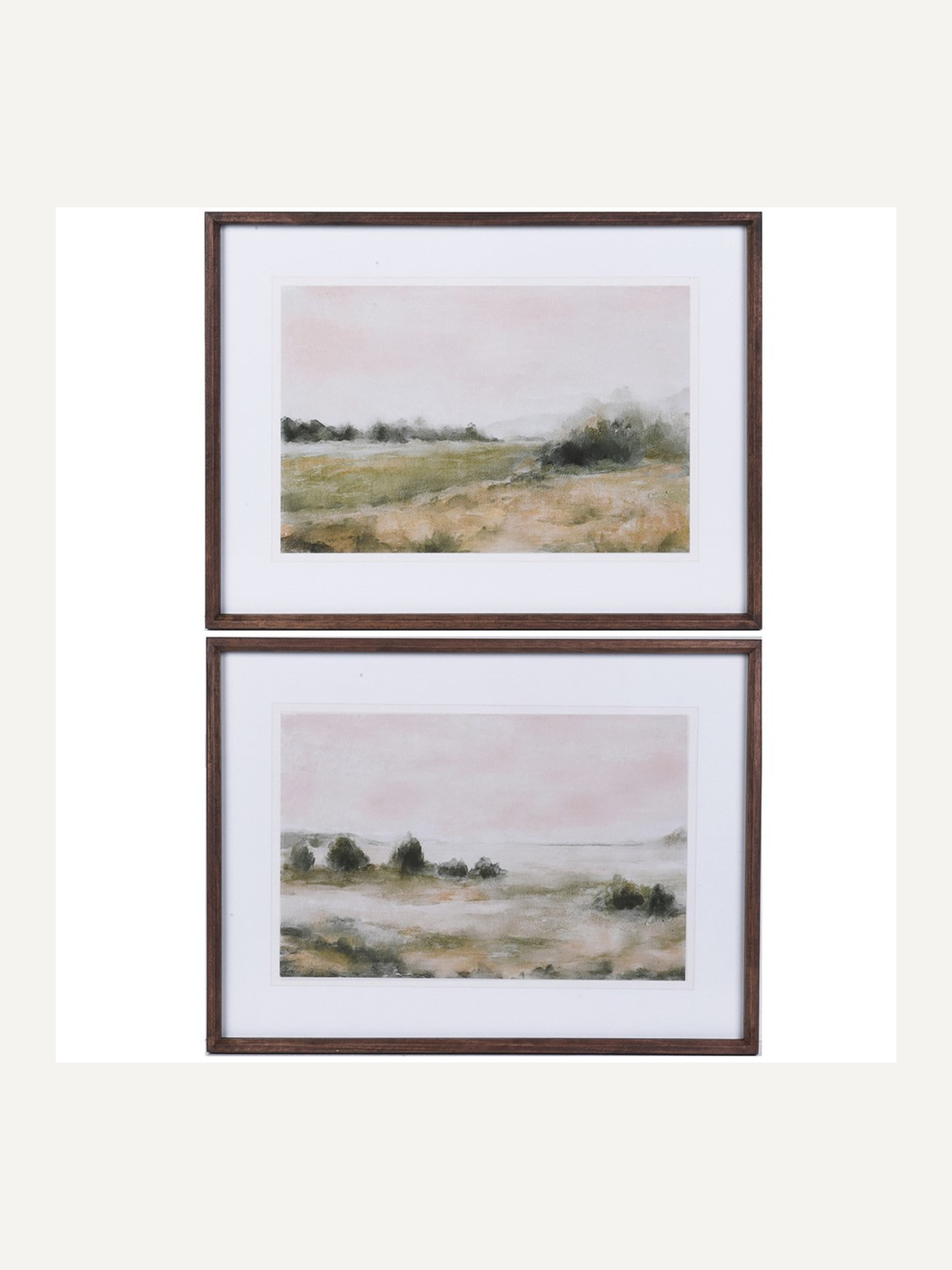 Two framed landscape prints of a shore line on a white background