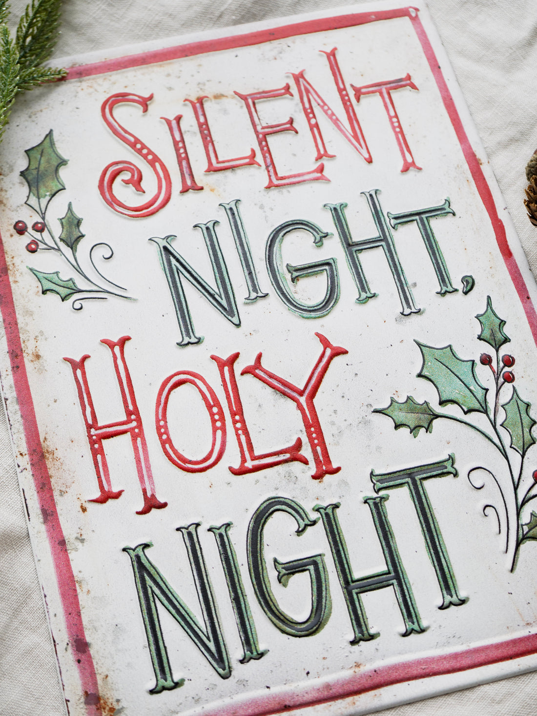 Christmas-themed sign with &