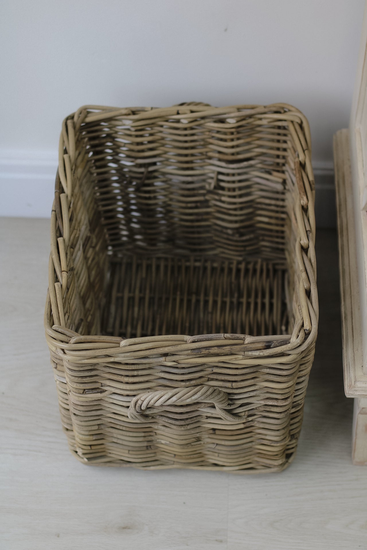 grey buff wicker storage basket with handles for home decor