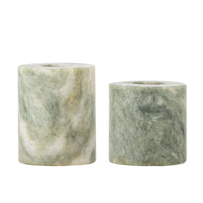 Two green marble vases on a white background