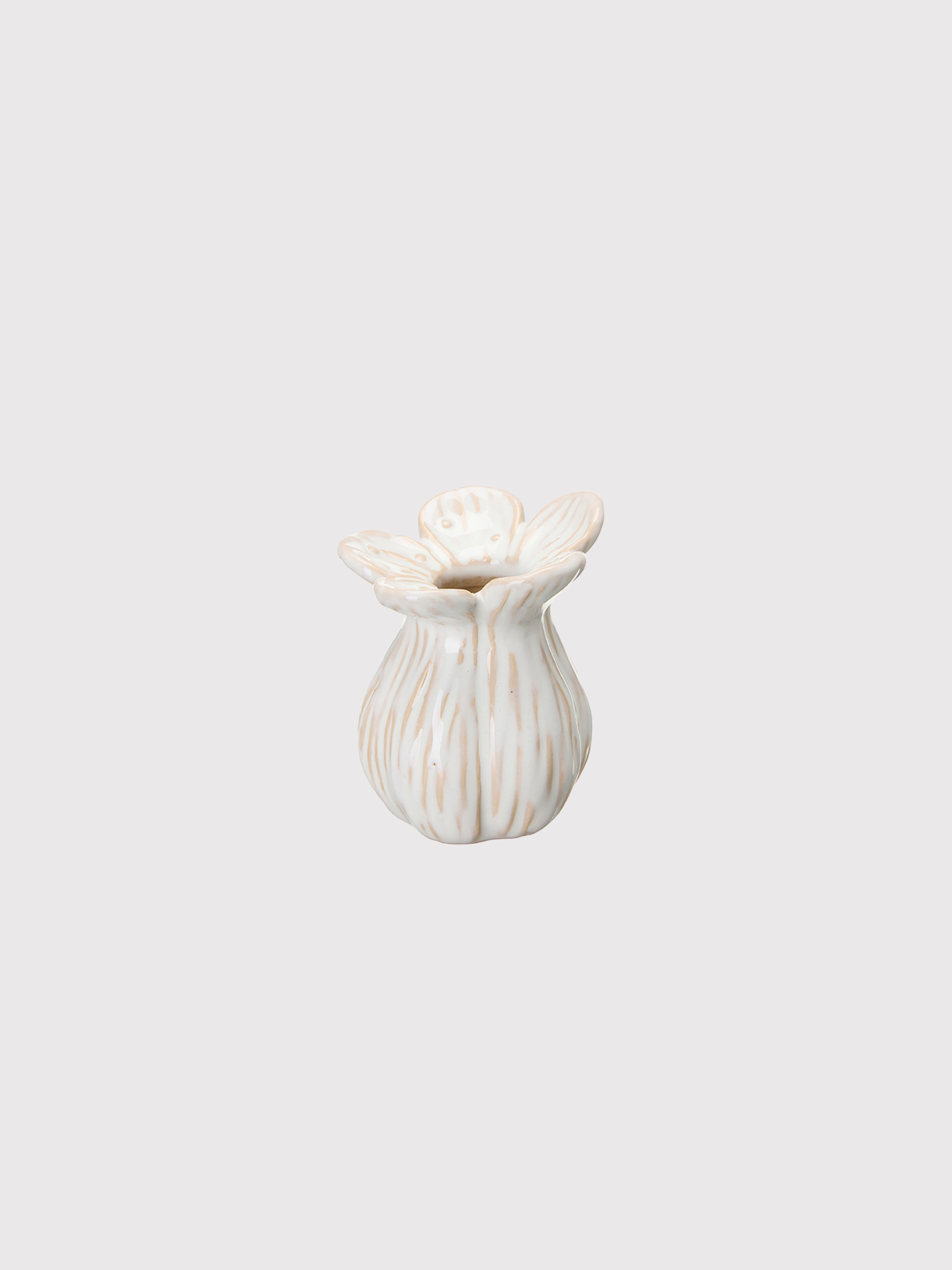 White ceramic bud vase with ribbed texture on a light gray background