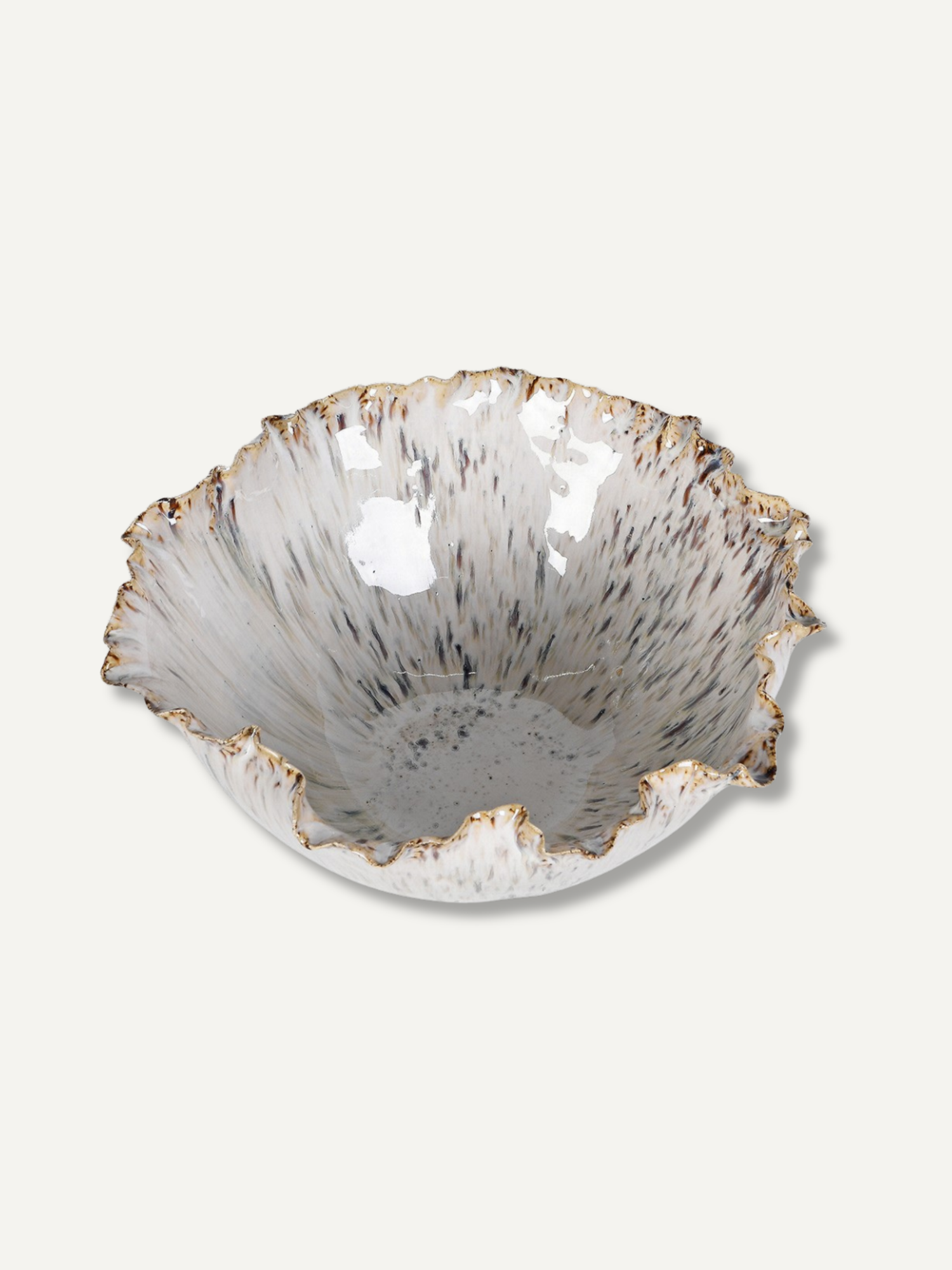 A handcrafted ceramic bowl with a flared, organic rim, featuring a textured speckled glaze in white, gray, and black with a metallic gold edge.