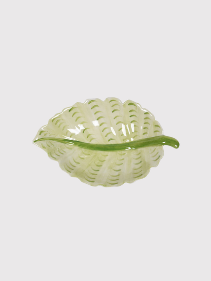 Decorative leaf-shaped plate on a white background