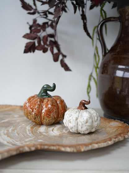 Orange and white stoneware knobbly pumpkins