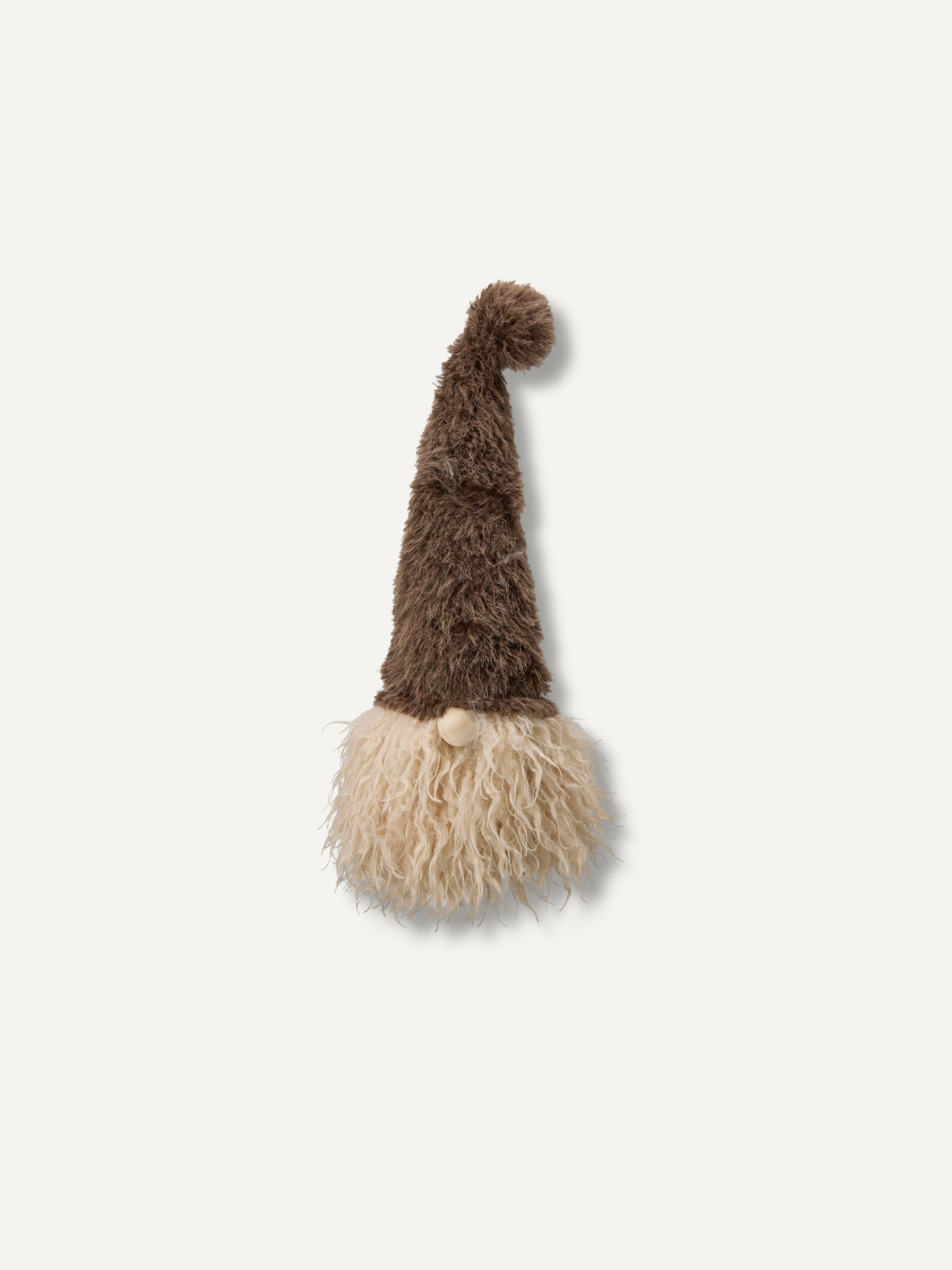 A small plush gonk decoration with a tall brown fuzzy hat, cream beard, and a tiny wooden bead nose, centered on a light gray background.