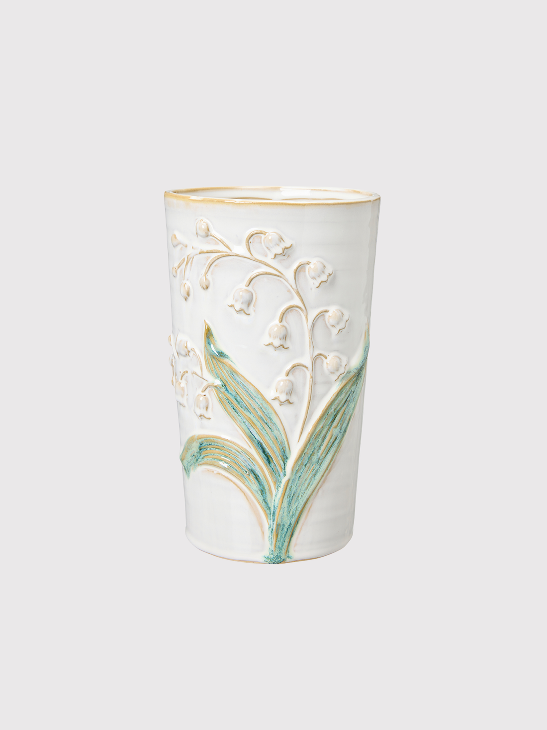 Decorative vase with floral design on a white background