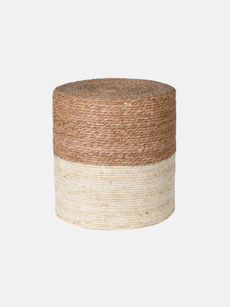 Woven stool with two-tone design on a white background