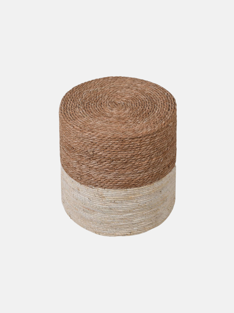 Woven cylindrical stool with two-tone design on a light gray background