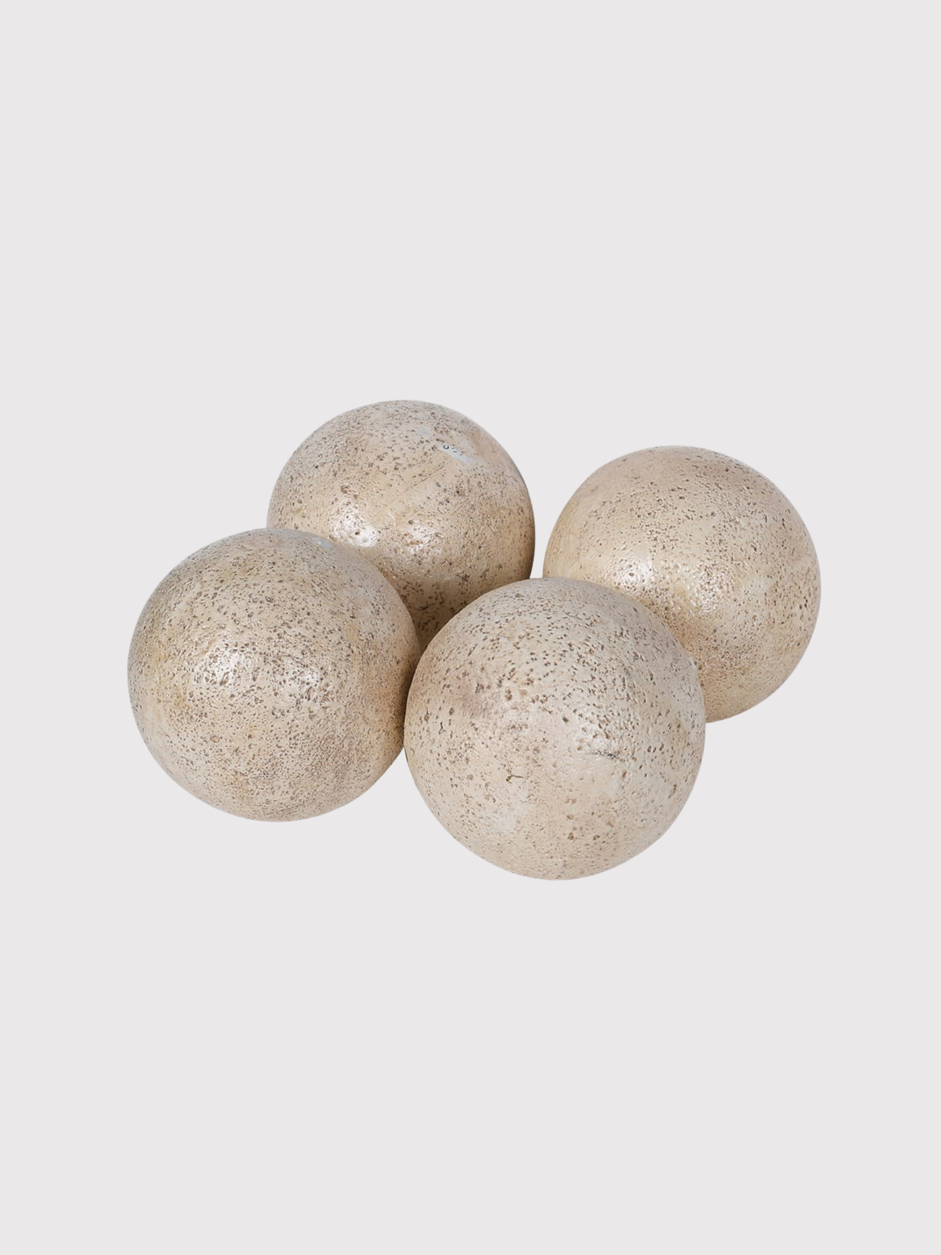 Four beige Travertine Effect Decorative Ball objects on a light gray background