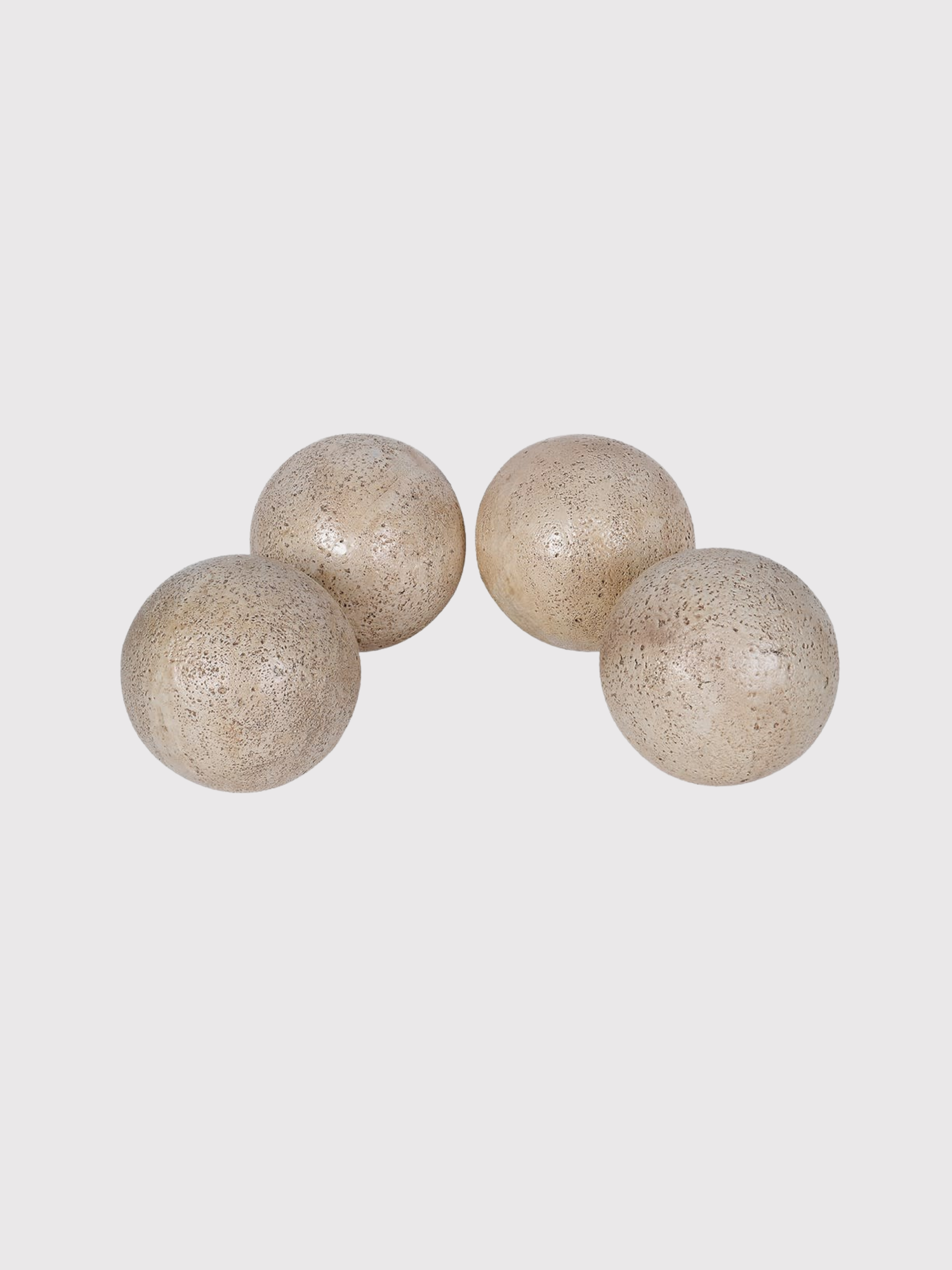 Four beige decorative Travertine Effect Decorative Ball on a light gray background