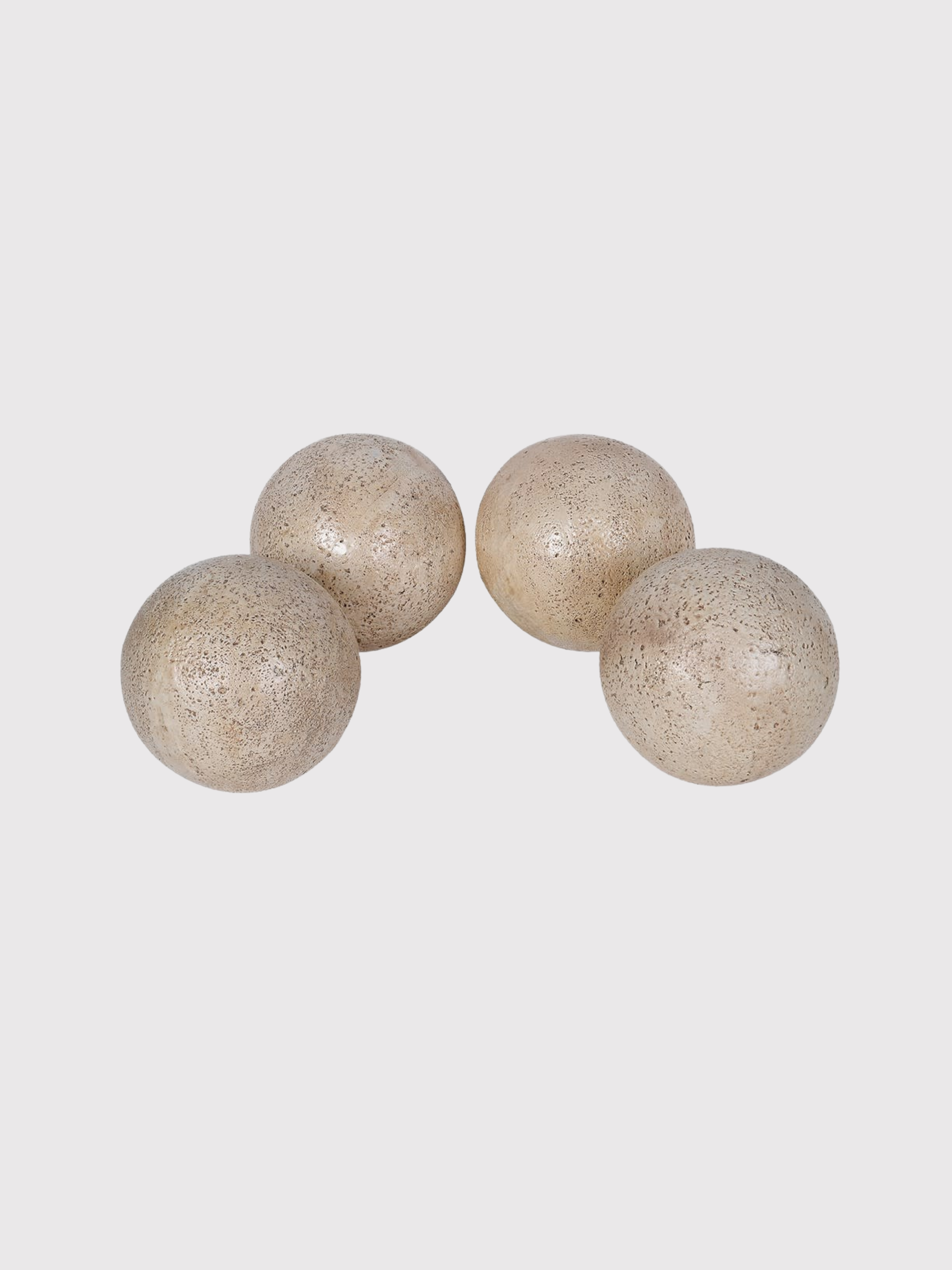 Four beige decorative Travertine Effect Decorative Ball on a light gray background