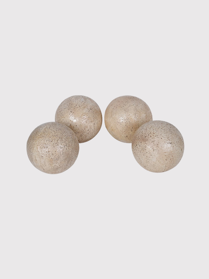 Four beige decorative Travertine Effect Decorative Ball on a light gray background