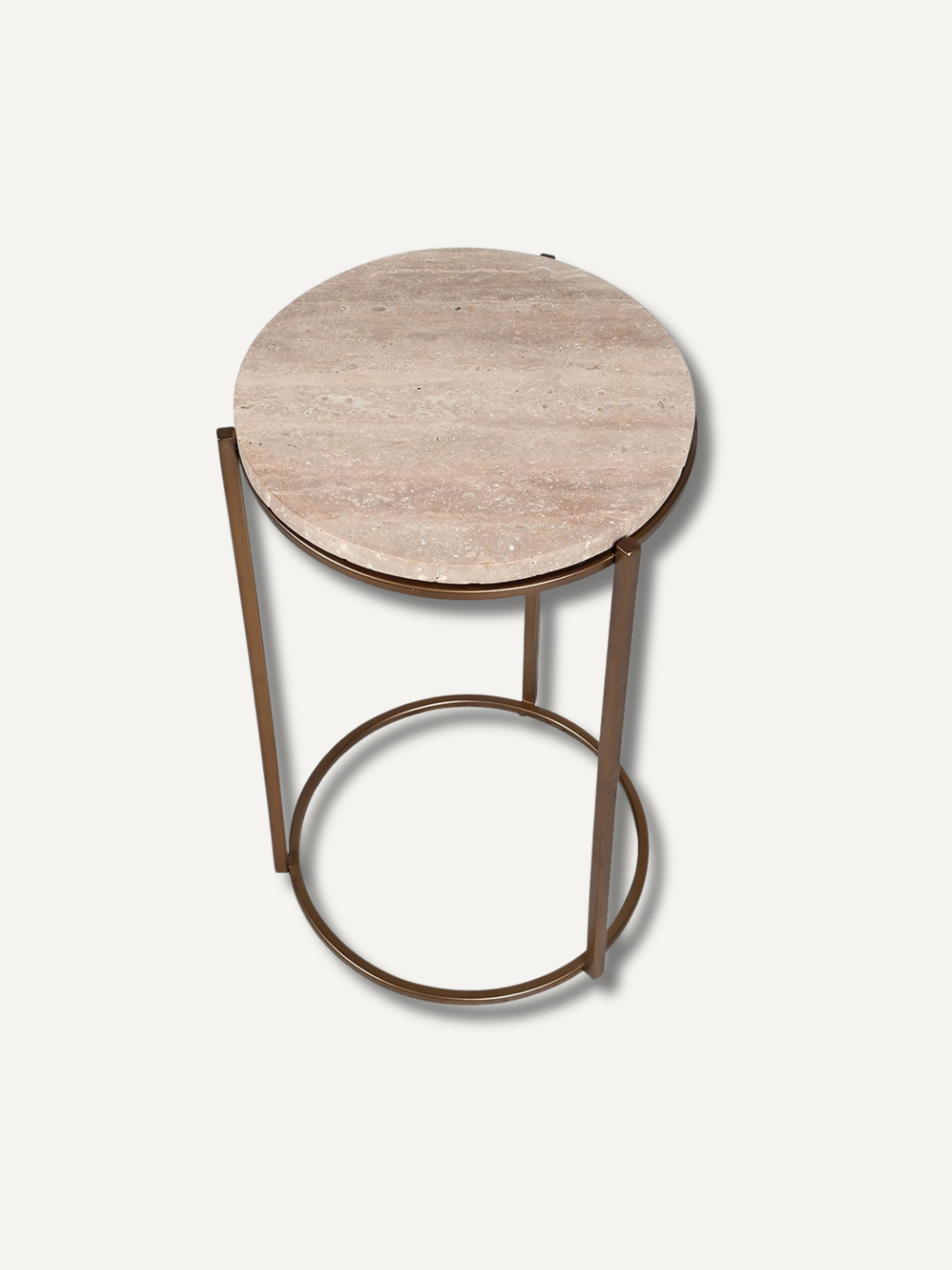 Small round table with travertine top and metal base on a light gray background