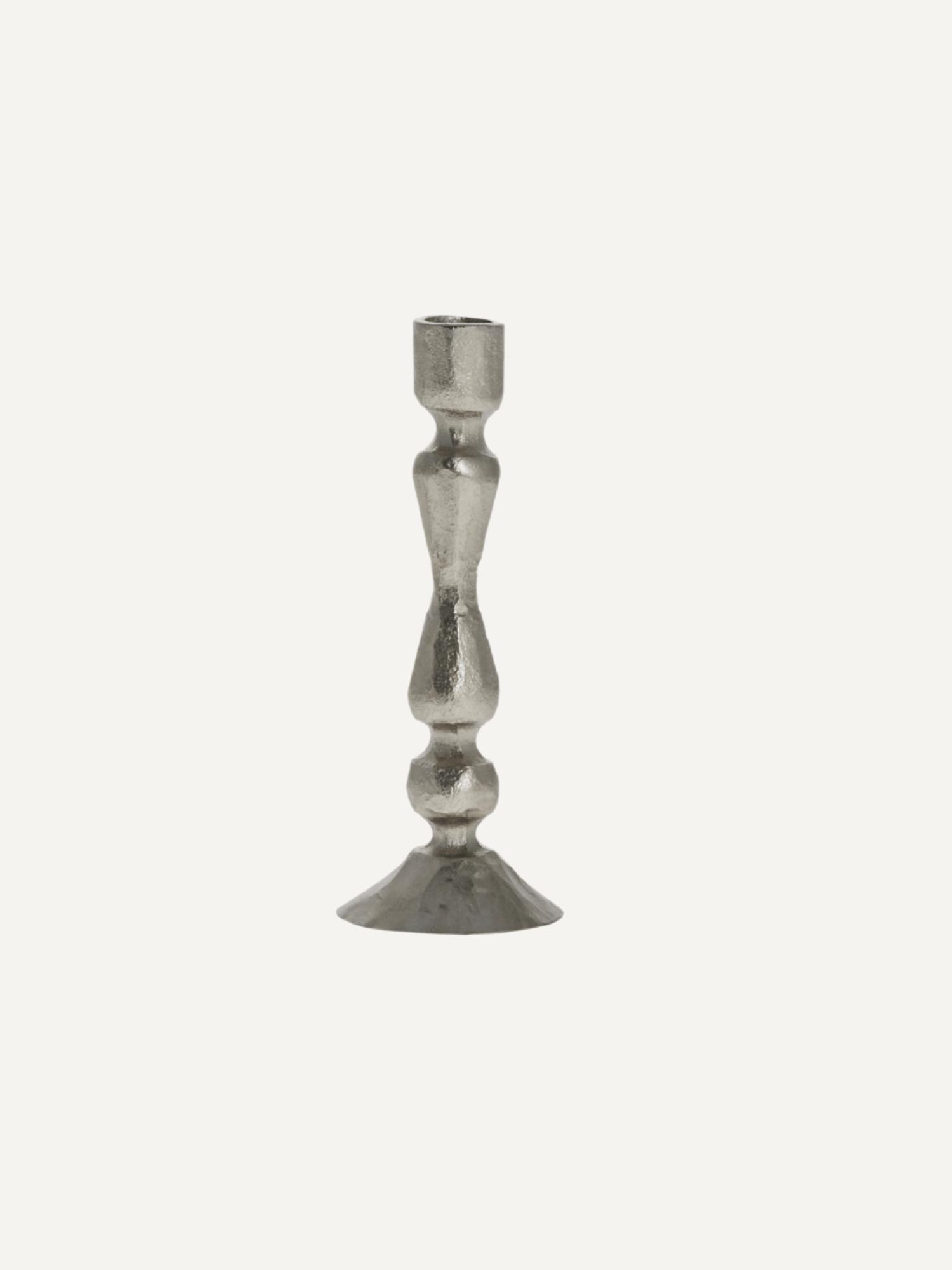 Silver candle stick on a white background