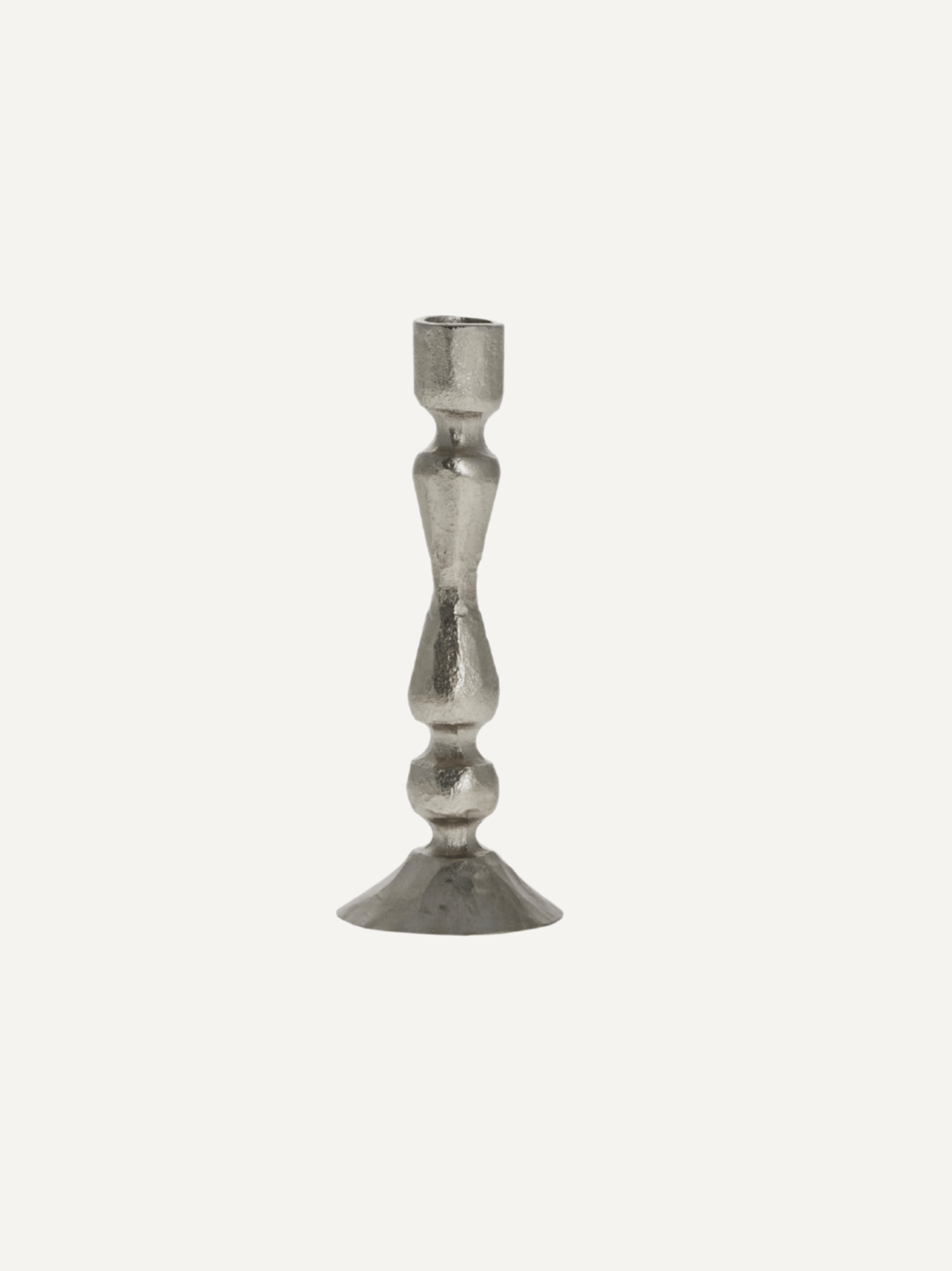 Silver candle stick on a white background