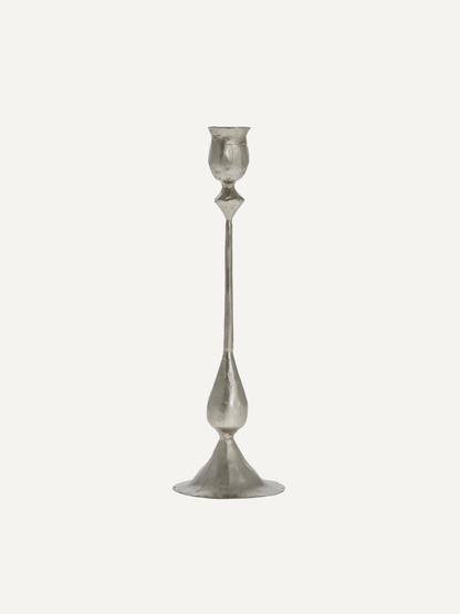 Silver candle stick on a white background