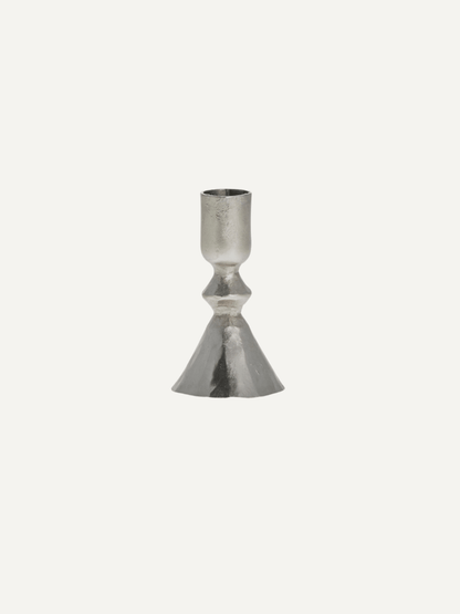 Metallic candle stick on a white background
