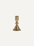 Gold metal vintage style candlestick on a white background