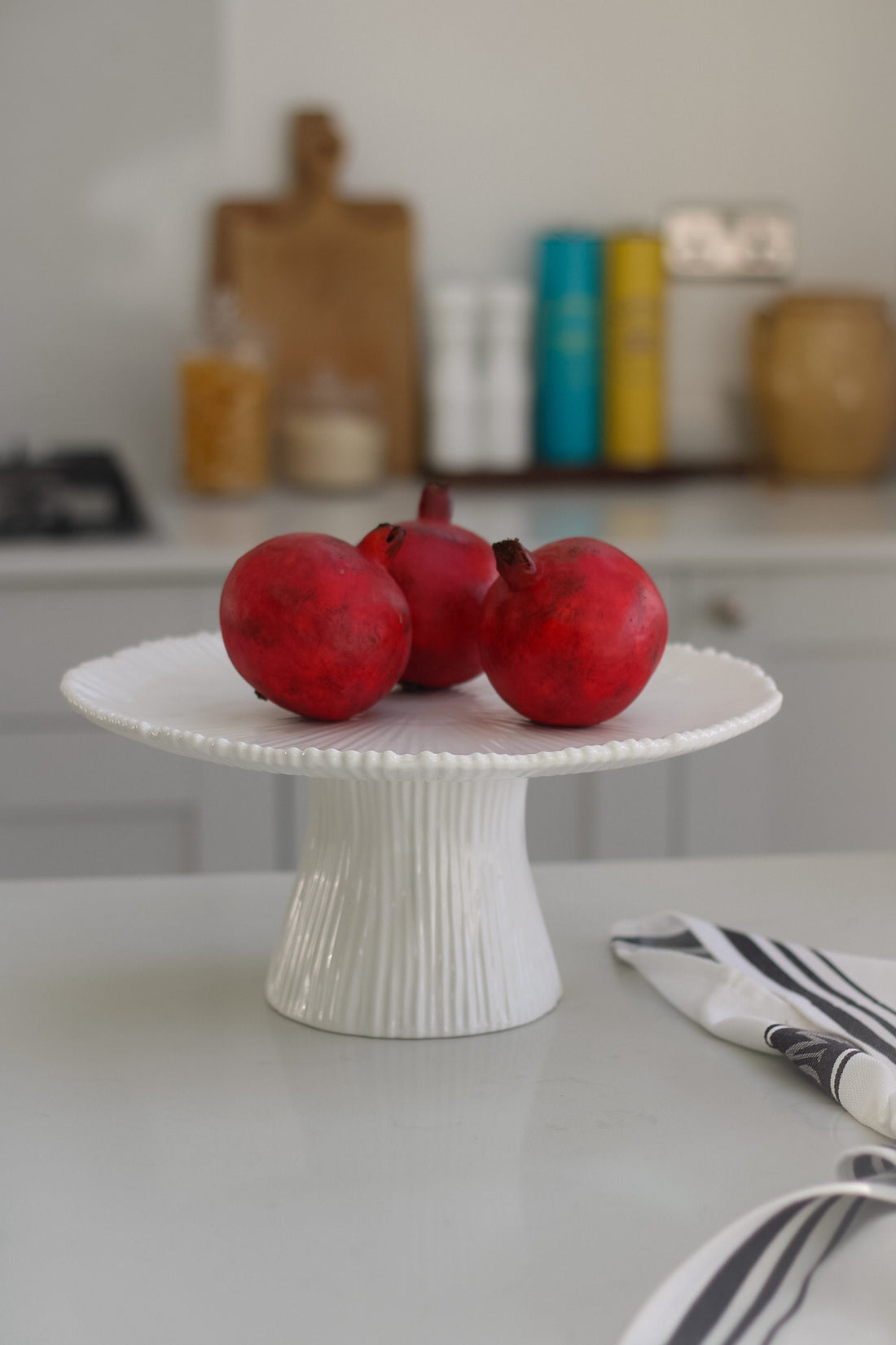 elegant white ceramic cake stand