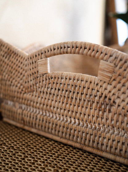Close-up of a woven basket tray with a blurred background